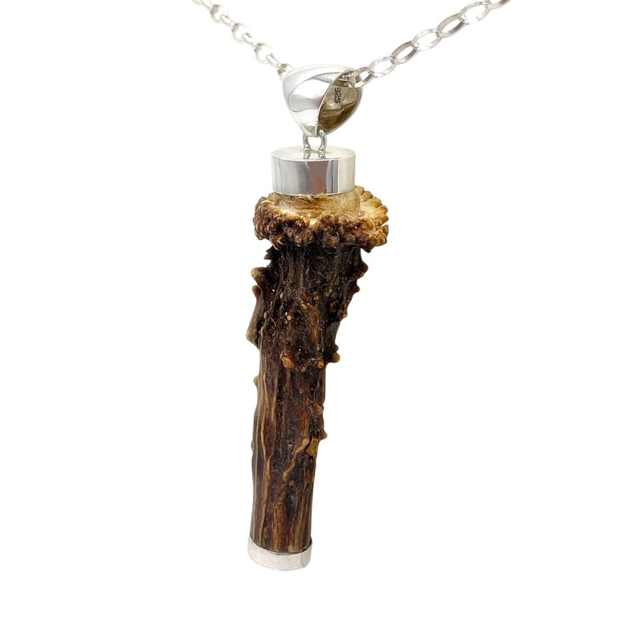 Natural deer antler pendant with polished 925 sterling silver bail and organic surface