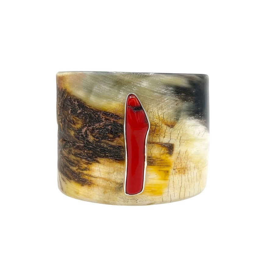Buffalo horn cuff bracelet with red branch coral set in 925 sterling silver, angled front view