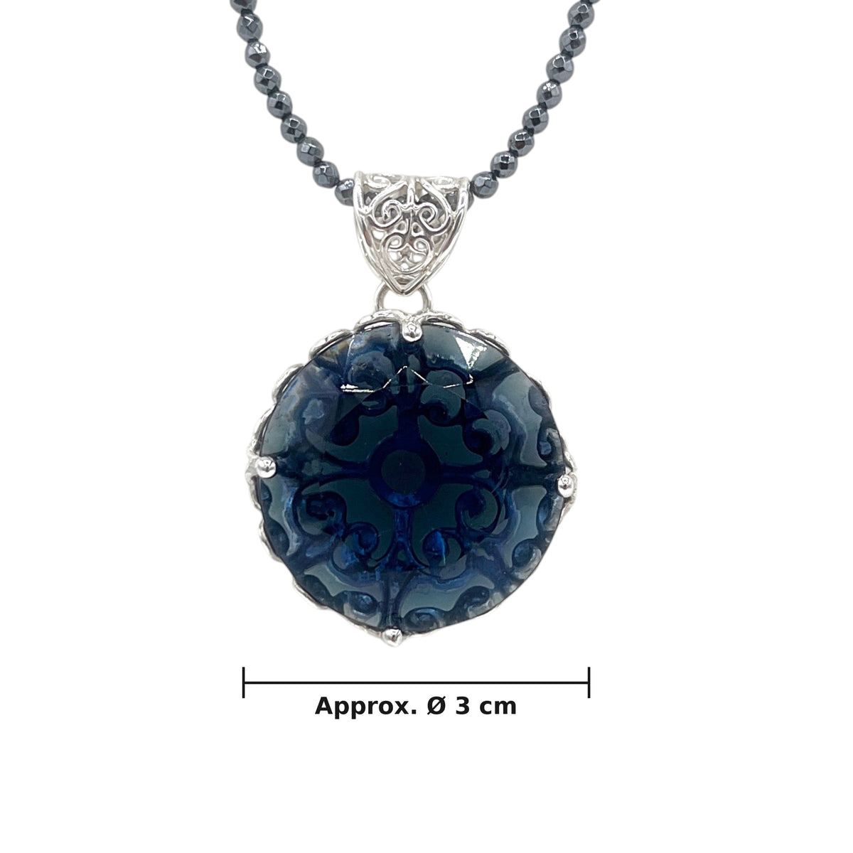 Model wearing sapphire blue Buddha Hair Swarovski vintage sterling silver pendant